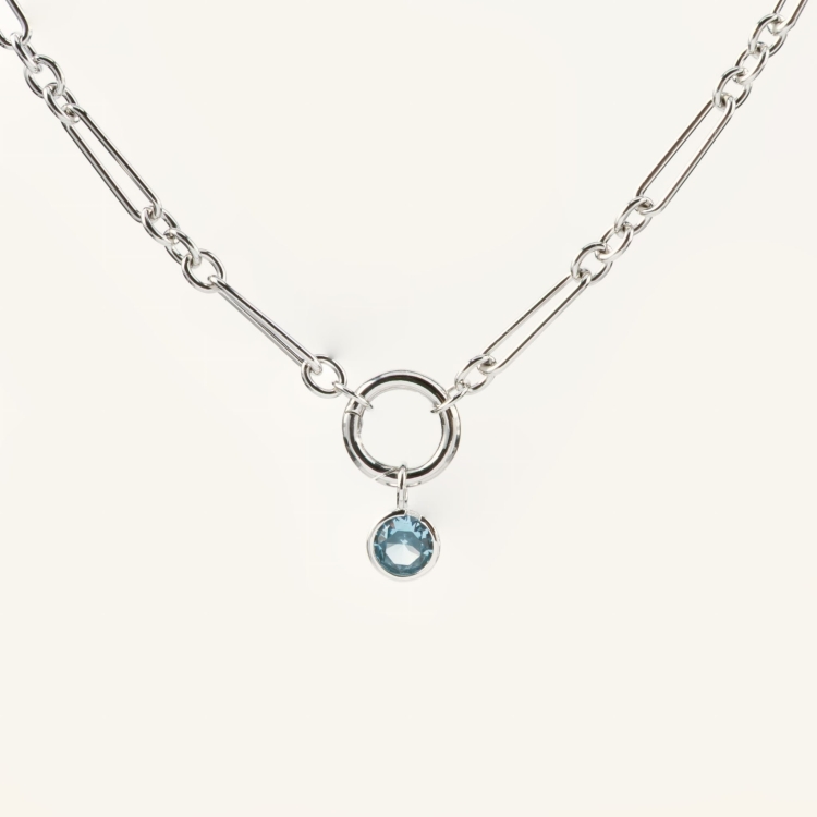 Zawieszka srebrna z niebieską cyrkonią.