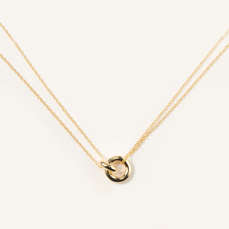 Naszyjnik srebrny pozłacany połączony dwoma kółeczkami.