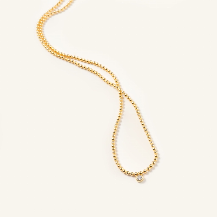 Naszyjnik srebrny pozłacany z cyrkonią.