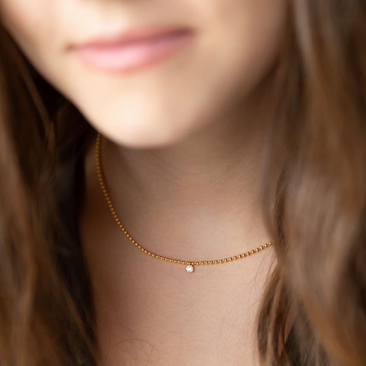 Naszyjnik srebrny pozłacany z cyrkonią.