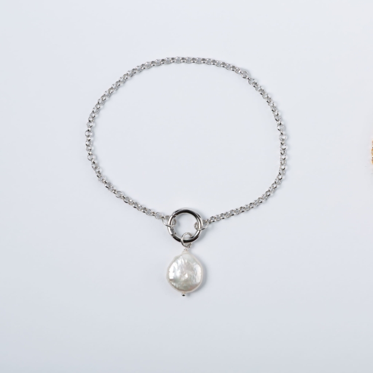 Zestaw srebrna bransoletka z zawieszką z naturalnej perły.