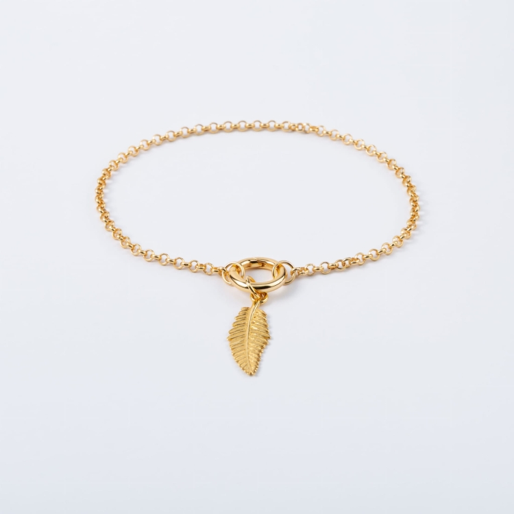 Zestaw srebrna pozłacana brasoletka z kółkiem i zawieszka z gałązką.