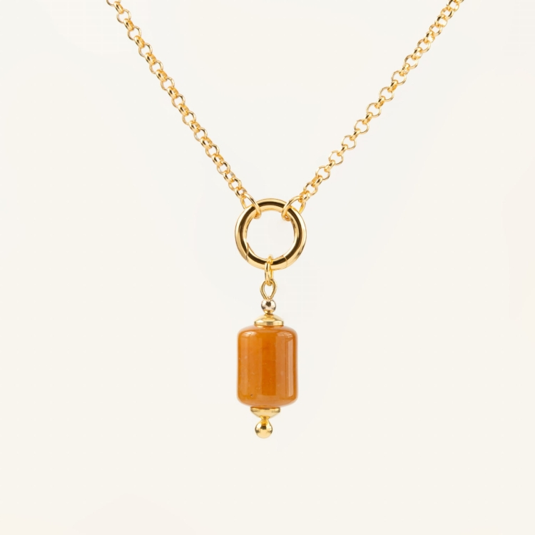 Zestaw srebrny pozłacany nszyjnik z kółeczkiem i zawieszka z kamienia o bursztynowym kolorze.