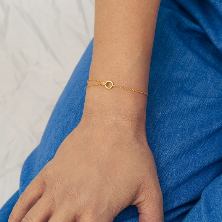 Bransoletka srebrna pozłacana połączona dwoma kółeczkami.