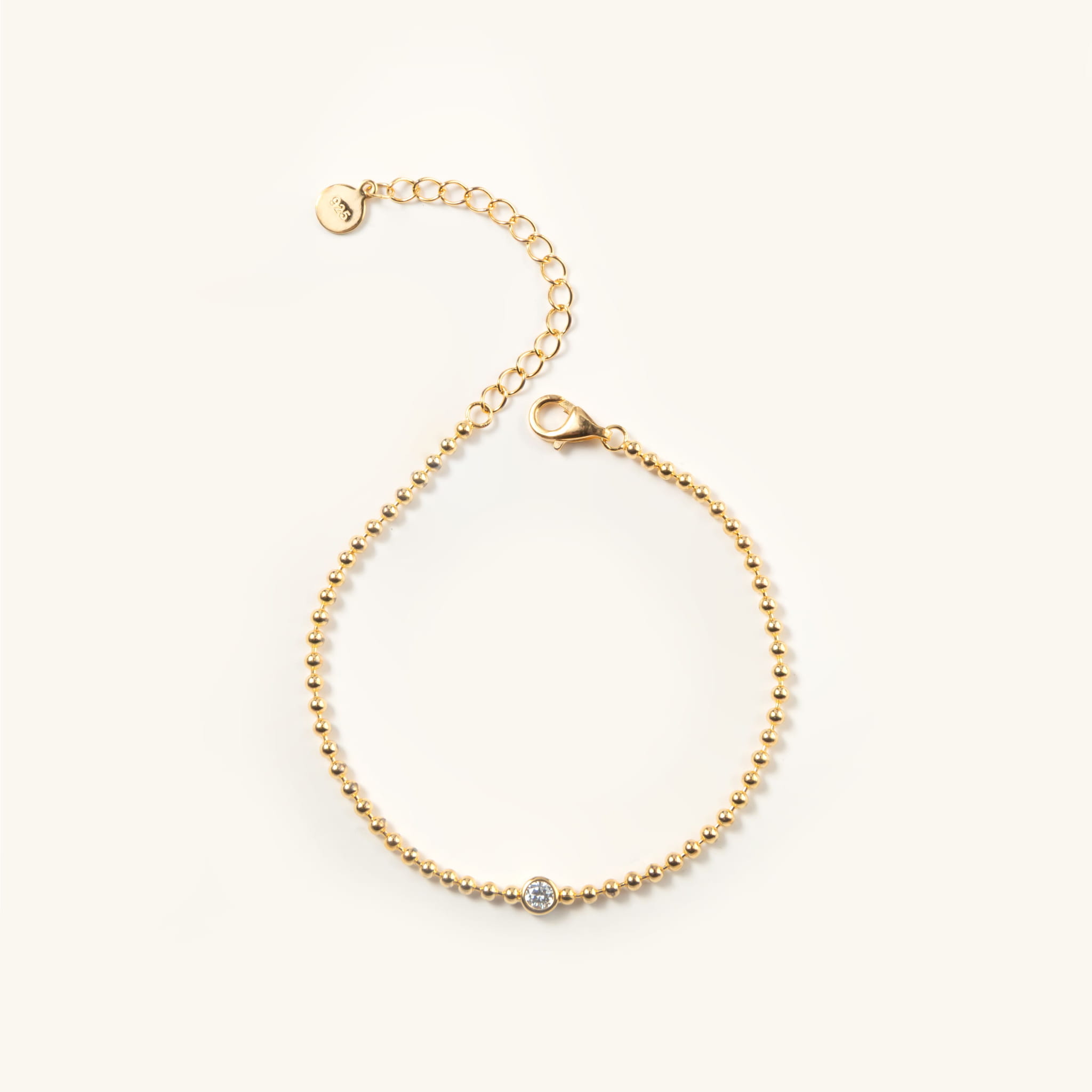 Bransoletka srebrna pozłacana z cyrkonią.